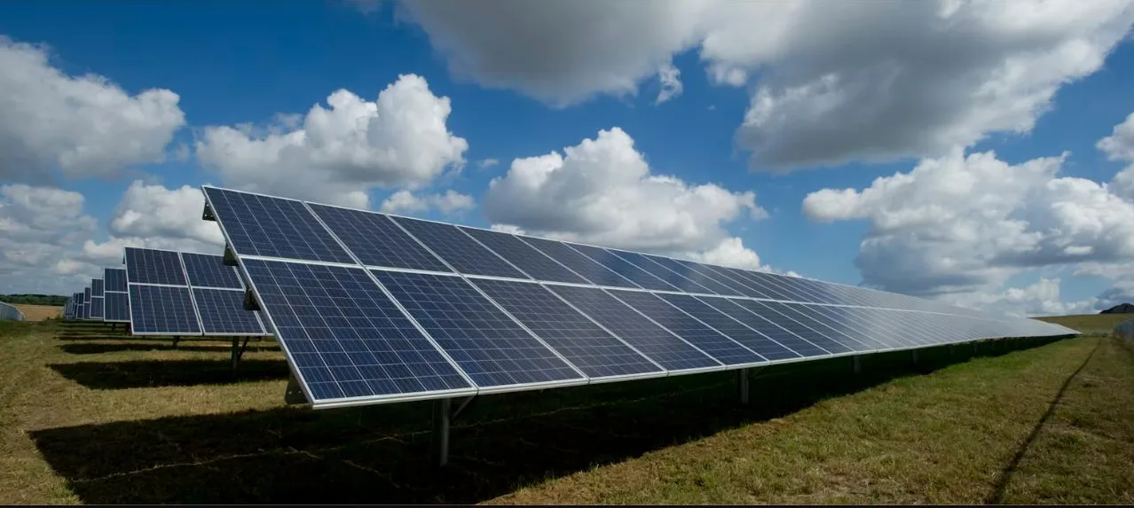 Solar panels — the engine behind Australian energy bill savings Ground-mounted solar panels under a clear blue Australian sky